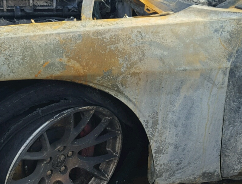 Illustration for article titled This Dodge Challenger SRT Hellcat Looks Like It Actually Traveled To Hell And Back